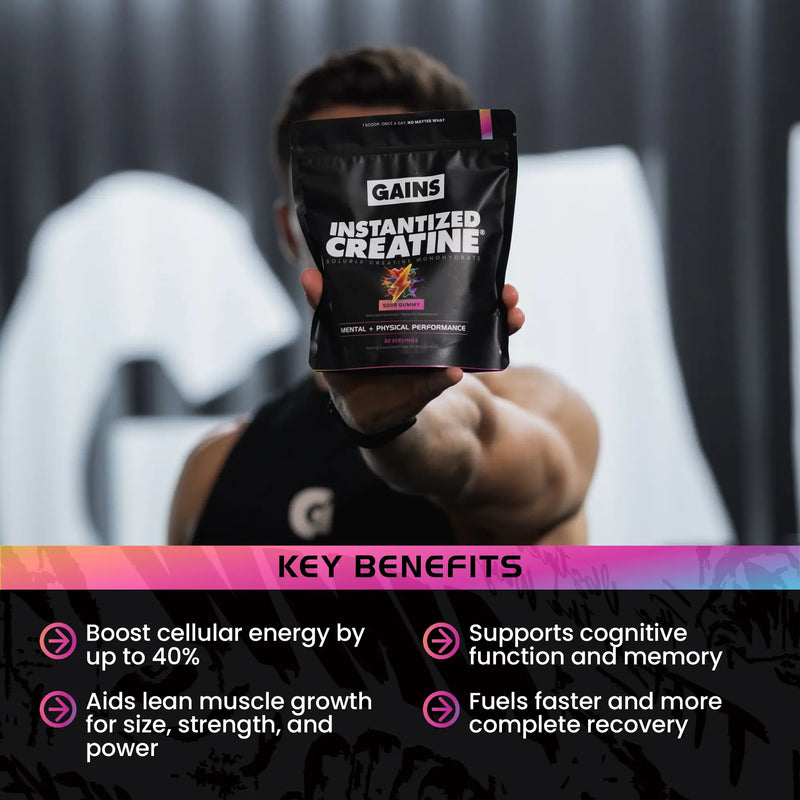 Person holding a package of 'GAINS Instantized Creatine' with key benefits listed below. | sour gummy