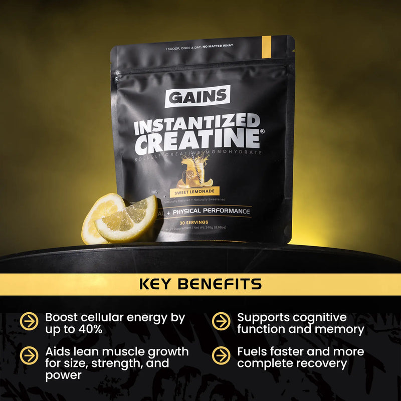 GAINS Instantized Creatine package with lemon slices on a dark surface | sweet lemonade