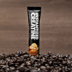 Instatized creatine caramel vanilla surrounded by coffee beans 