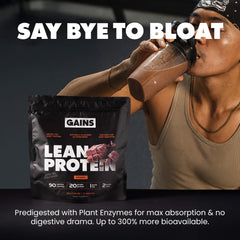 Person drinking a protein shake with a GAINS Lean Protein package in the foreground.